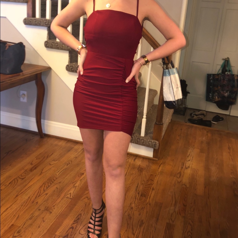 Red body con dress